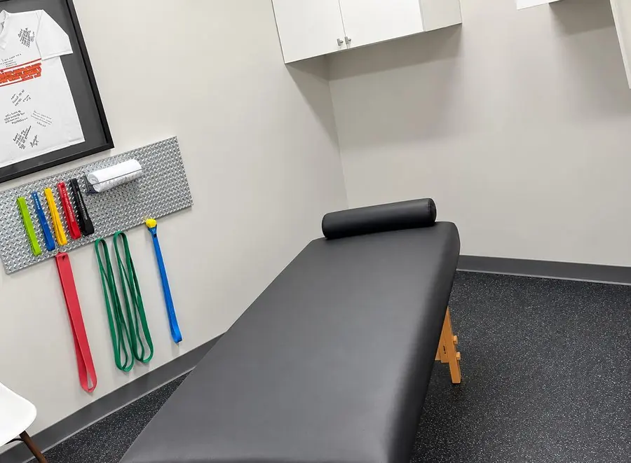 The recovery and assisted stretch table with resistance bands at Sports Lab Cinco Ranch